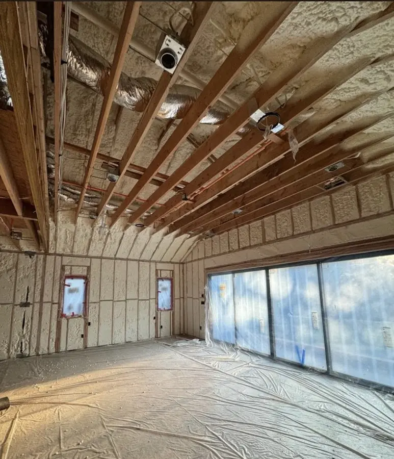 Interior walls and ceiling insulated with spray foam during new construction in Cary